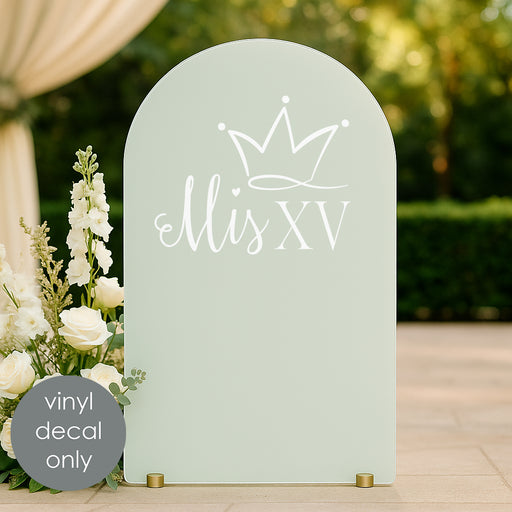 Elegant “Mis XV” vinyl decal with crown in white on light green backdrop, designed for quinceañera celebration decoration.