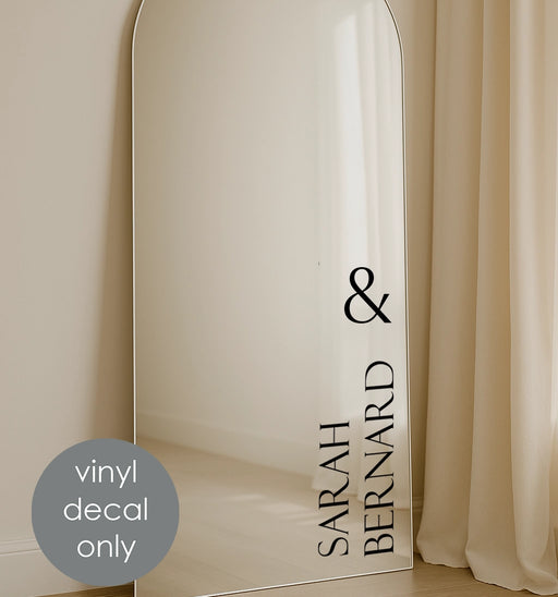 Custom wedding vinyl decal with bride and groom names on mirror welcome sign for ceremony decoration