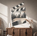 Film clapperboard and city skyline wall decal in a modern living room