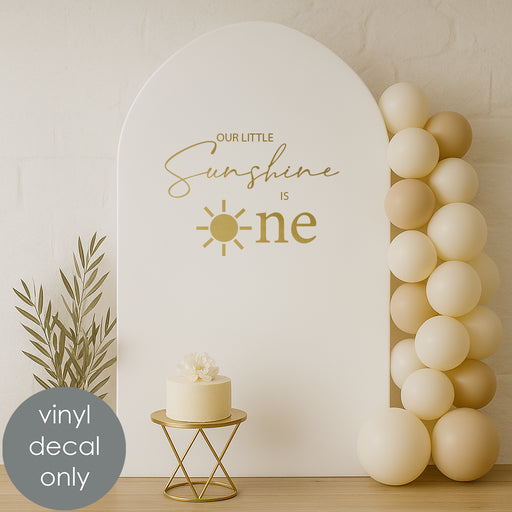 “Our Little Sunshine is One” vinyl decal with sunshine design for baby’s first birthday backdrop decoration