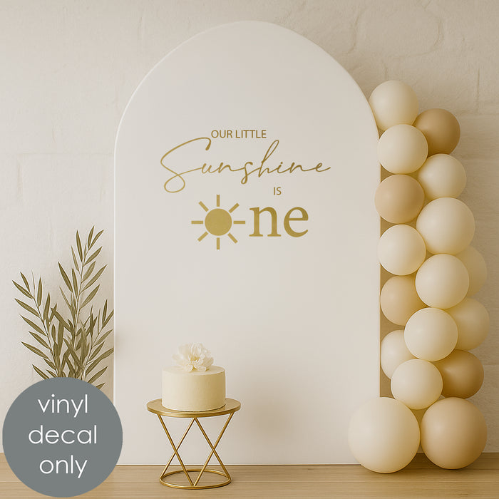 “Our Little Sunshine is One” vinyl decal with sunshine design for baby’s first birthday backdrop decoration