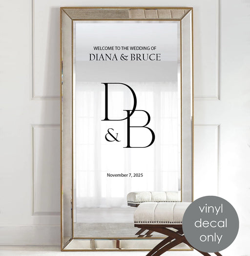 Custom wedding vinyl decal with names, initials, and date on mirror welcome sign for elegant wedding décor