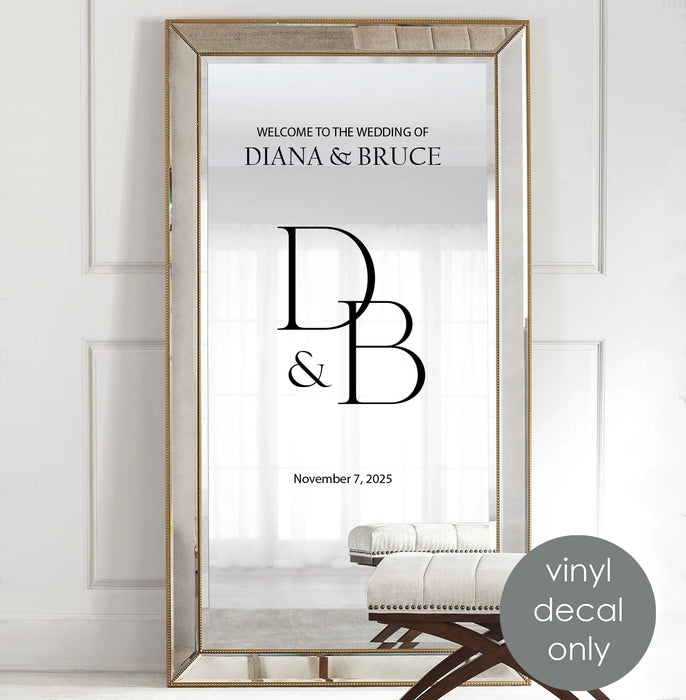 Custom wedding vinyl decal with names, initials, and date on mirror welcome sign for elegant wedding décor
