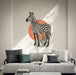 Zebra with botanical leaves and terracotta circle wall decal in an interior