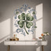 Green four-leaf clover with blue botanical scrollwork wall decal in an interior
