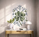 Green four-leaf clover with blue botanical scrollwork wall decal in an interior