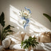 White lotus flower with flowing blue petals wall decal shown in a boho interior 01 room interior.