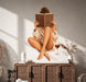 Woman reading wall decal shown in a boho interior 03 room