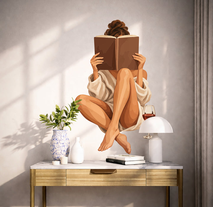 Woman reading wall decal shown in a scandinavian interior 02 room