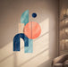 Colorful Coral and Blue Geometric Vinyl Wall Decal Art displayed in a beauty salon interior