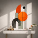 Colorful Orange and Black Geometric Vinyl Wall Decal displayed in a contemporary interior interior