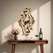 Colorful Wine Queen Mirrored Portrait Wall Decal Art displayed in a mid century modern interior