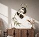 Colorful Playful Panda on Bamboo Vinyl Wall Decal Art displayed in a boho interior interior