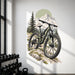 Mountain bike with alpine peaks and evergreen trees vinyl wall decal in a gym room