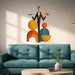 Geometric server balancing a tray wall decal above a sofa.