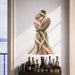 Abstract couple wall decal displayed above a bar counter.