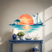 Colorful Sailboat Sunset Ocean Island Wall Decal Art in an interior setting