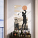 Golfer swinging a club in a sunset wall decal interior