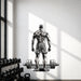 Bodybuilder standing before a barbell wall decal in a gym with dumbbells