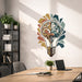Colorful brain inside a light bulb wall decal in a bright office interior
