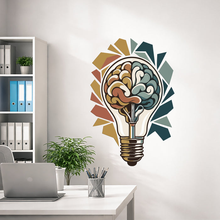 Brain and light bulb wall decal above an office desk