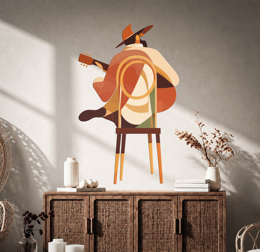 Colorful guitar player wall decal displayed in a room